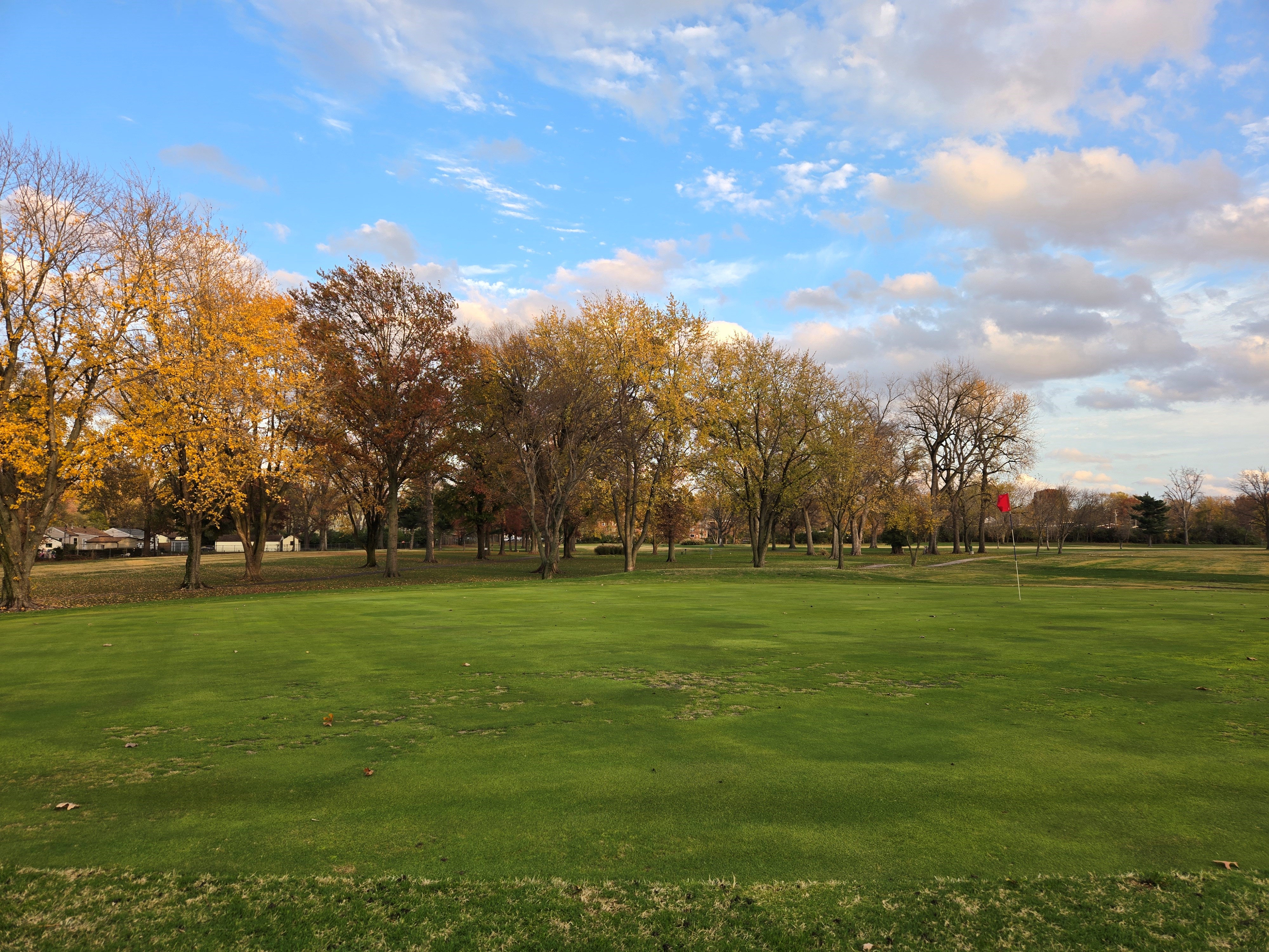 Golf course with golden trees