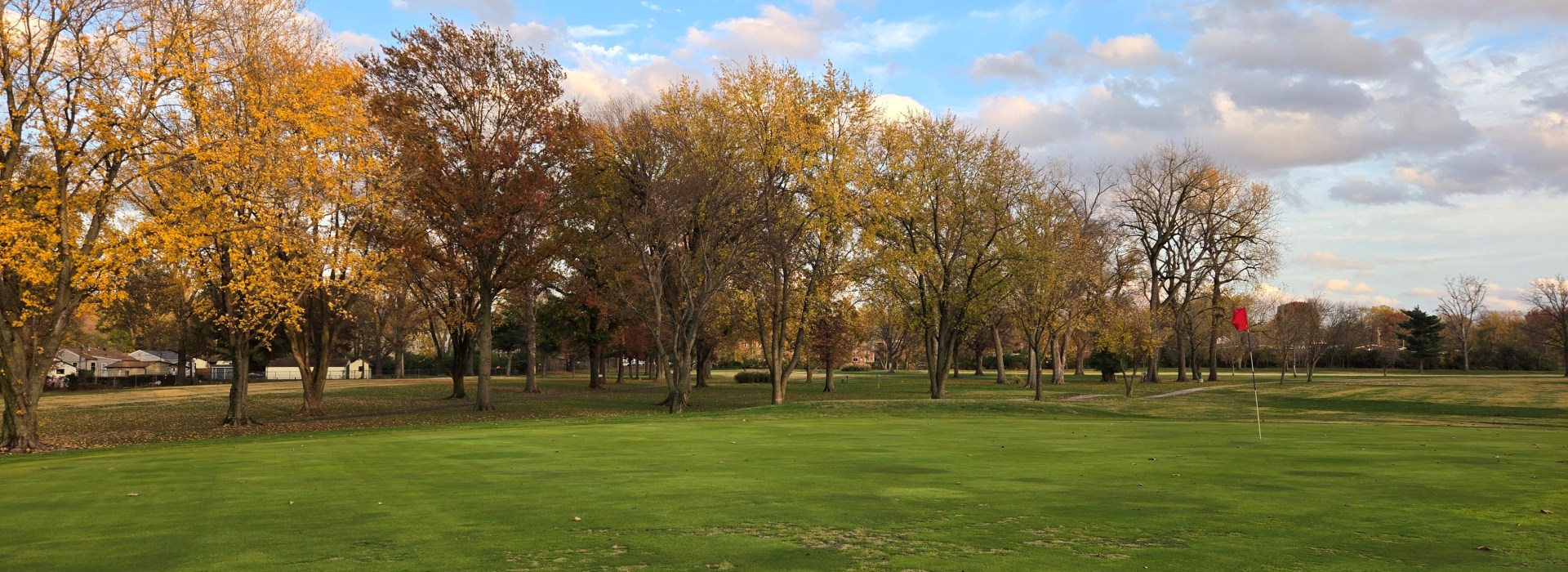 Golf course with golden trees